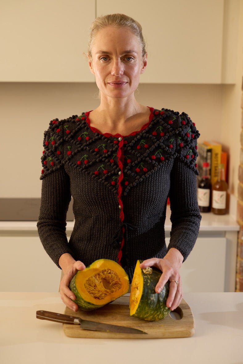 handknitted charcoal merino wool cardigan with cherry embroidery