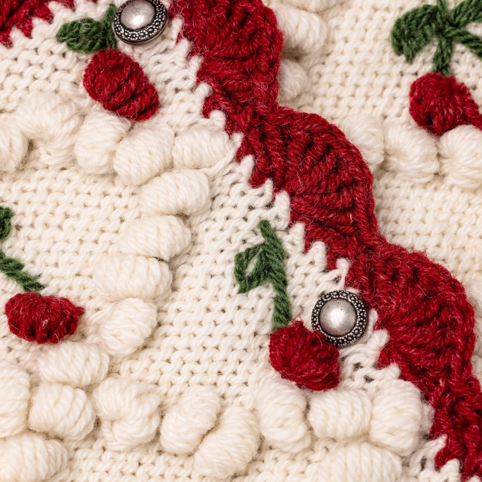 alpine inspired embroidered knit cardigan