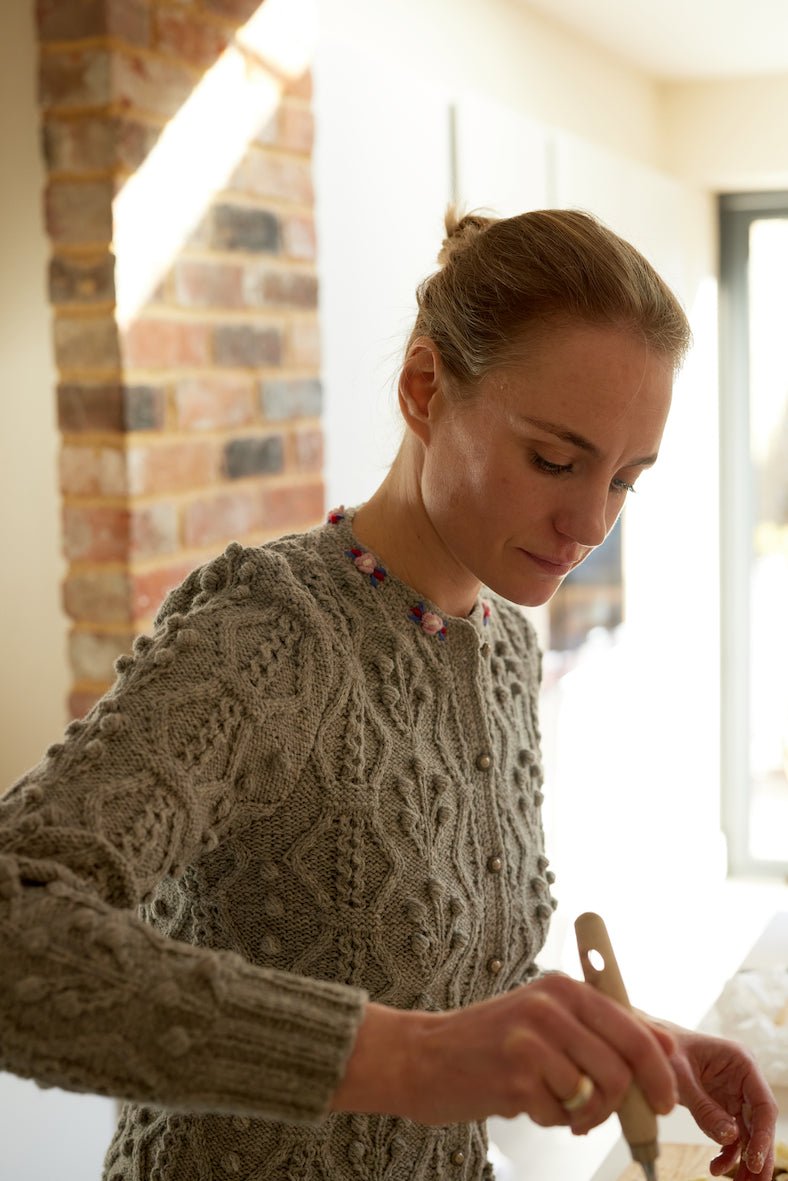 grey handknit cardigan with alpine knit texture