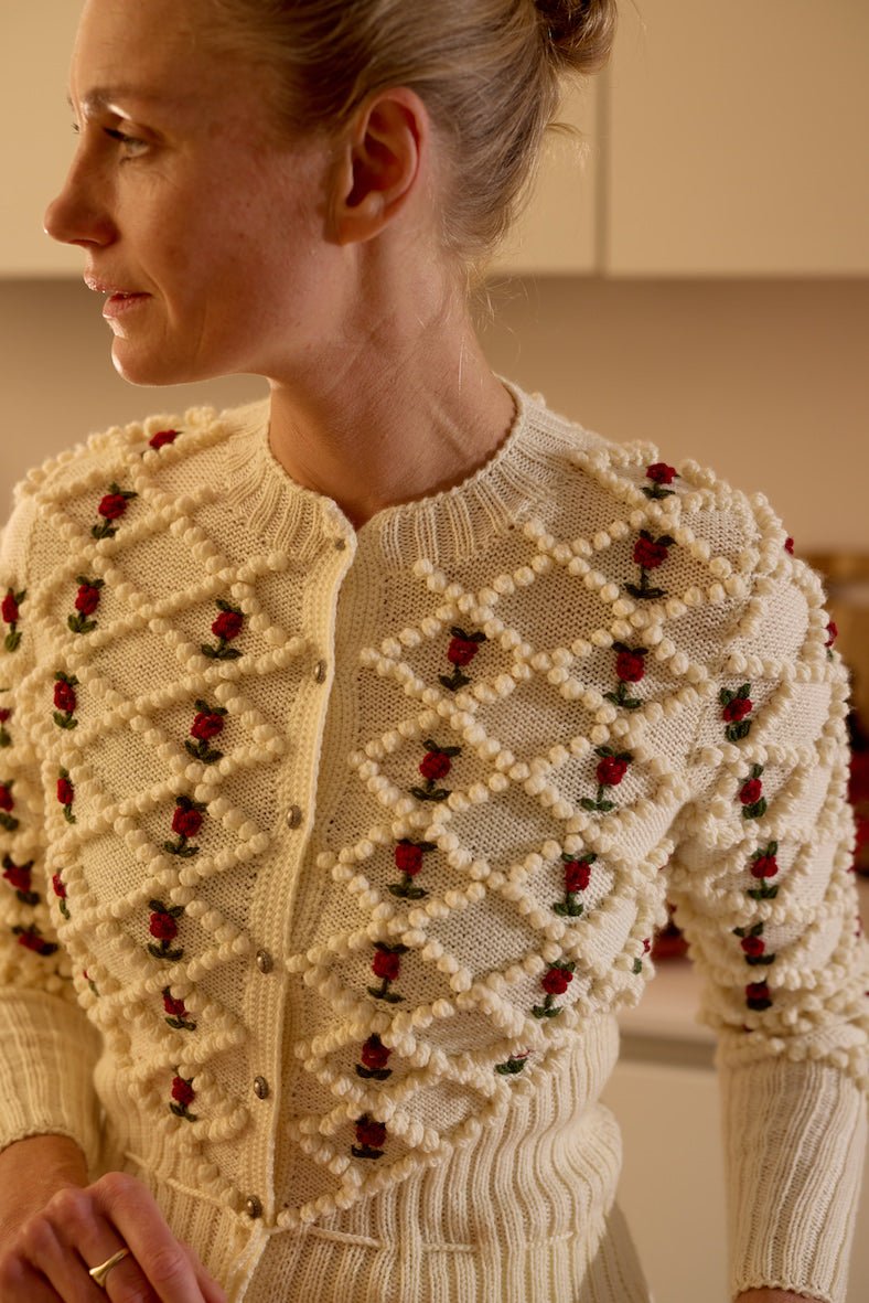 handknitted cream white merino wool cardigan with embroidered flowers