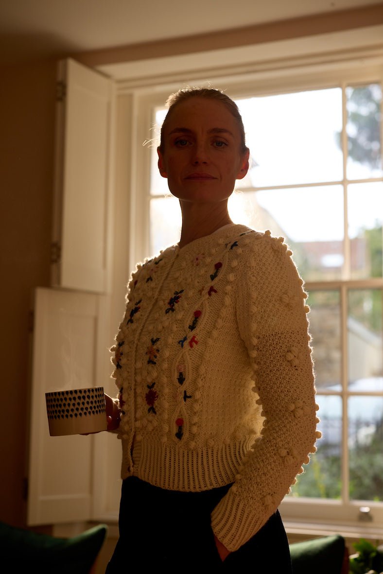 handknitted cream white merino wool cardigan with floral embroidery