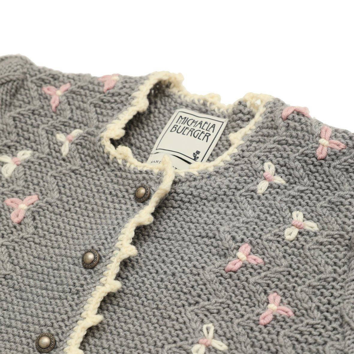 Detail of textured knit stitches and embroidery on Seraphina cardigan