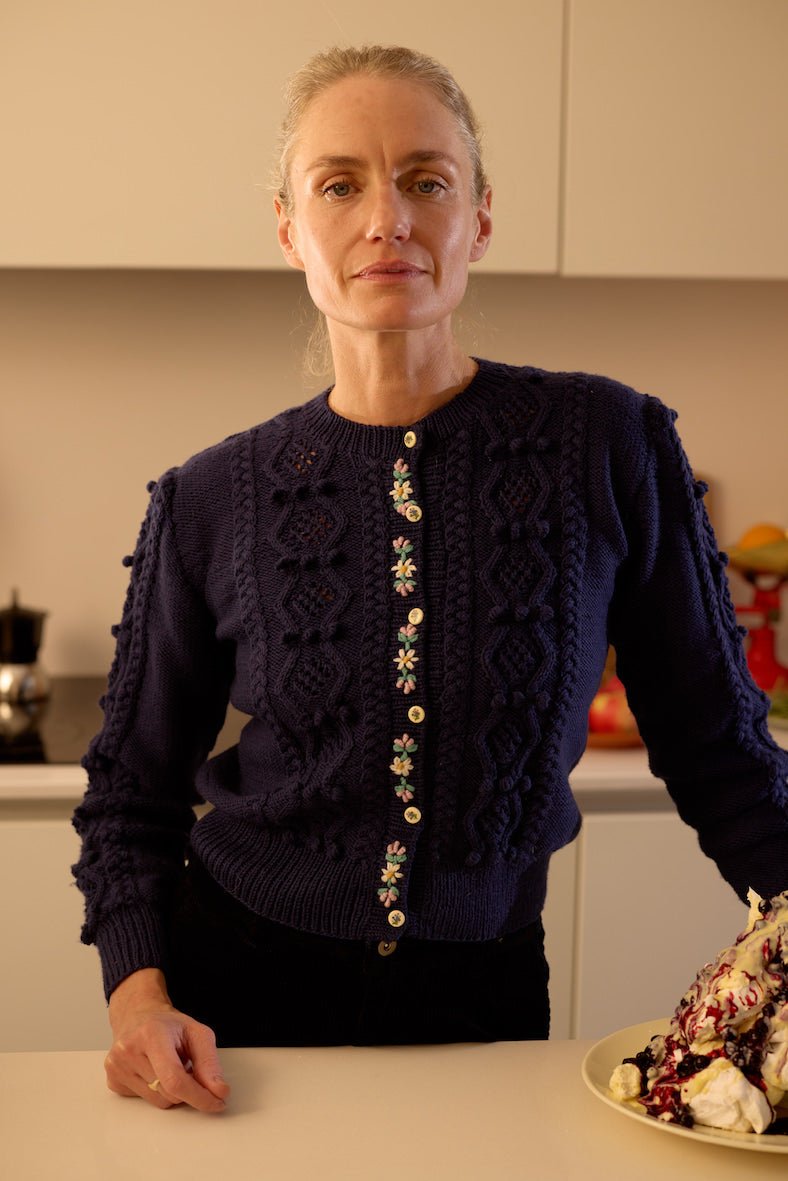handknitted dark blue merino wool cardigan with embroidered details