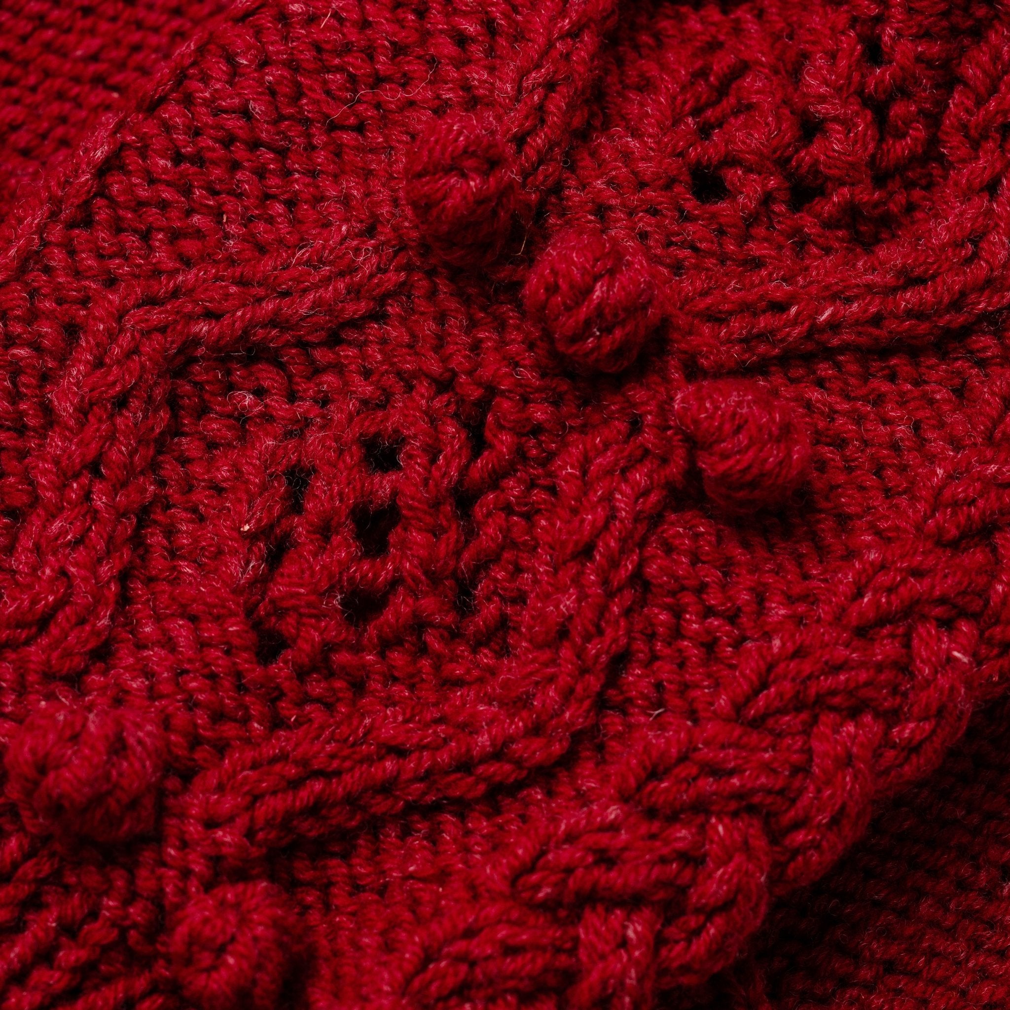 women wearing deep red handknitted cardigan